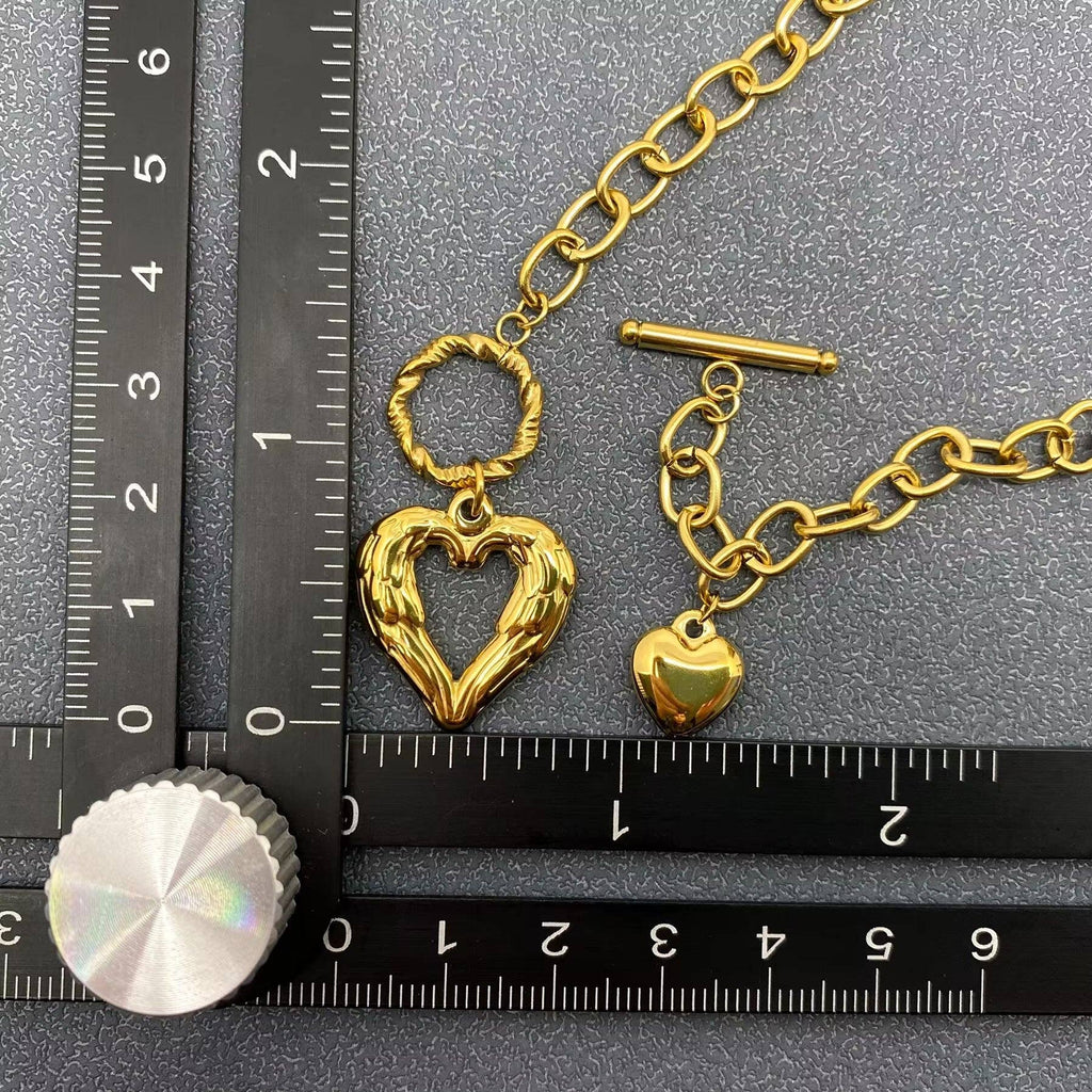 Double Heart Winged Charm Buckle Necklace